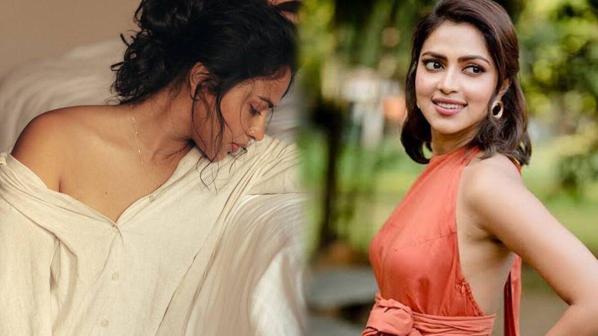 சட்ட பட்டன் போடுங்க தோழி!.. கிளுகிளுப்பு உடையில் சூடேத்தும் அமலாபால்!..